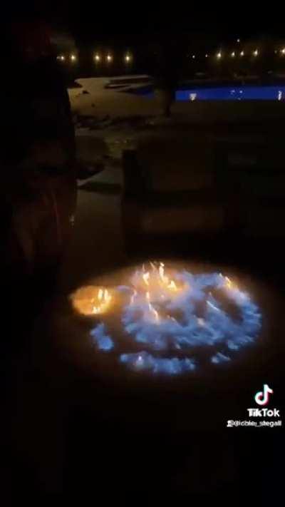 Lighting a propane fire pit covered in snow