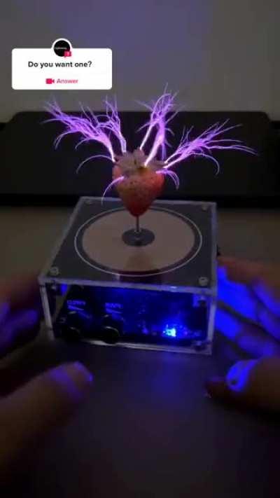 Tesla coil featuring a strawberry
