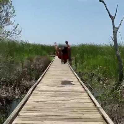 Backflipping on a boardwalk