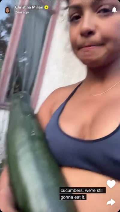 Christina Milian with a giant zucchini 🥴👀