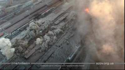 The Russian aviation dropping bombs on the infrastructure of Mariupo. Video capture by a drone