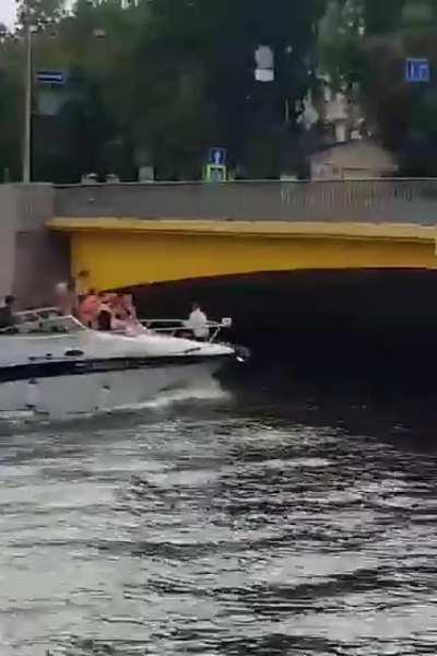 Girl’s head versus bridge (bridge wins)