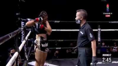 After her arm pops out of her socket during a Muai Thai bout, Petchsaifah uses the referee's 8-count to pop it back in and resumes fighting