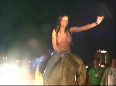 Wild country hottie riding topless!