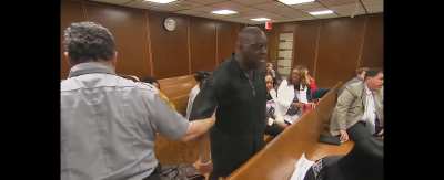 Father confronts son's killer in court