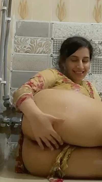 Would you fuck a busty indian girl in her traditional clothes while taking a shower?