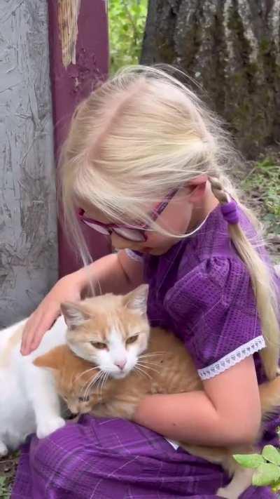 She waited patiently for the kitten to come to her so they could cuddle