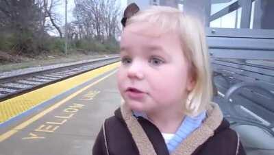 A little girl seeing a train for the first time!