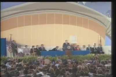 President Reagan reacts to a balloon popping during his speech in 1987