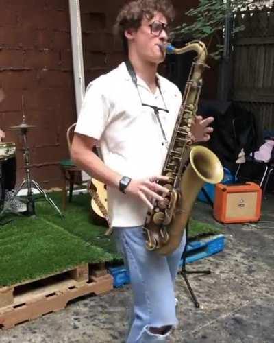 The saxophone player.