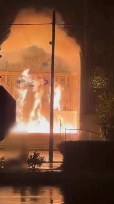 Burning down a religious school in response to execution of protestors