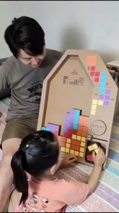 A cardboard Tetris box