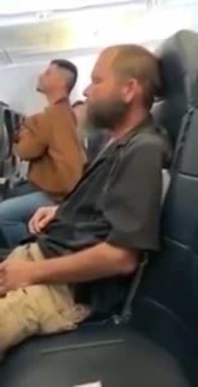 Man caught smoking rolled dope on airplane