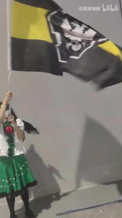 The original got deleted. Here's an HD copy of the Touhou cosplayer waving the Omsk flag before it becomes lost media.