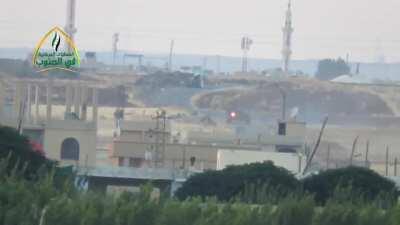 Sunni Youth Forces BGM-71 TOW team engage a Syrian tank on the road in the town of Jubayb - 6/29/2018