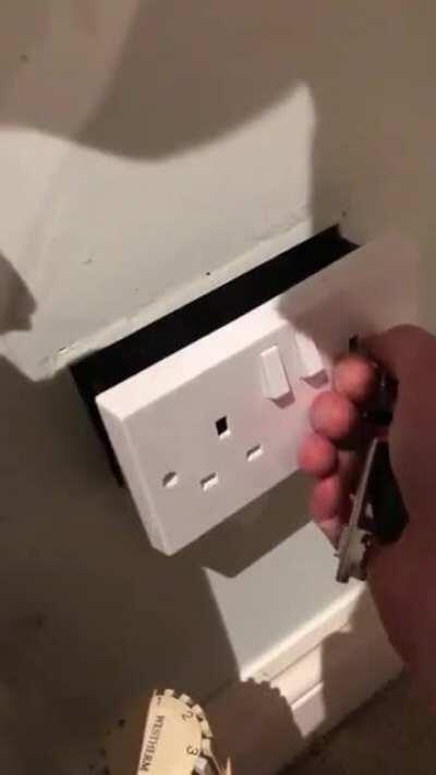 Wall safe disguised as a plug socket