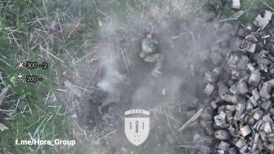 Russian small assault group obliterated by FVP drone's strikes. Video from May 18, Bakhmut direction.
