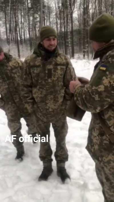 Field promotion for two Ukrainian soldiers. They're NCOs now!