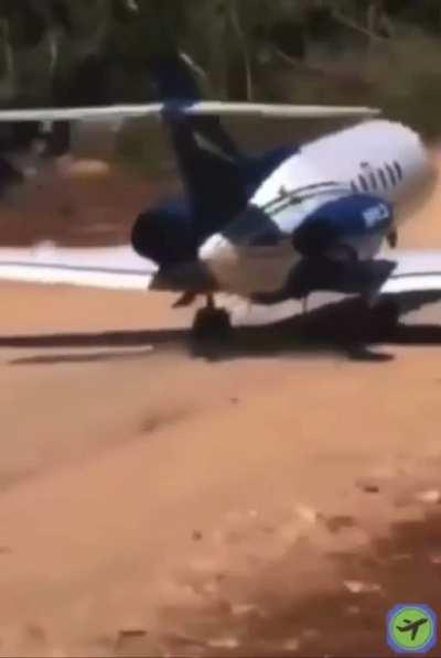 Hawker Jet taking off on a bumpy runway made of dirt.