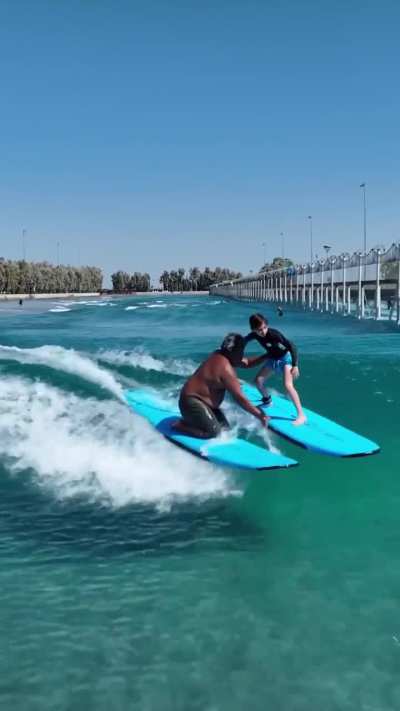 Surfing instructor save