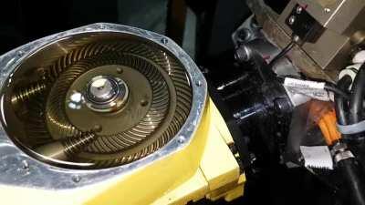 Gears cooperating inside the wrist of a small industrial robot, Fanuc M-10iA