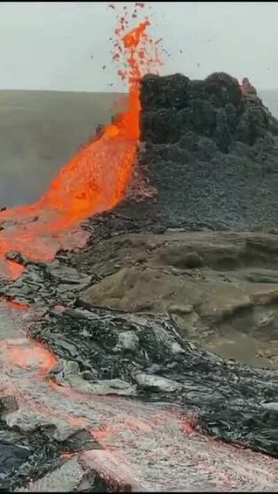 The moment half of Iceland's new volcano fell off