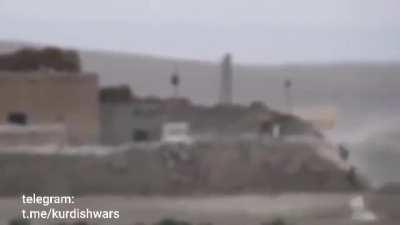 Kurdish fighters have a close encounter with a suicide bomber. 