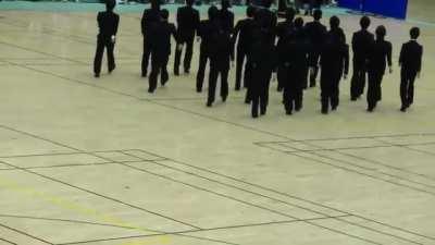 Japanese students demonstrate “precision walking”