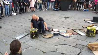 Street musician creates sick beat out of stuff he found in trash!