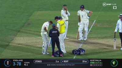 Joe Root cops a blow to his groin while facing Mitchell Starc. Ashes 2021-2022.