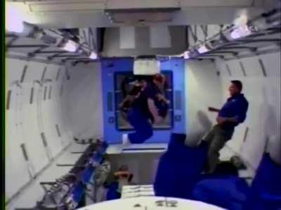 An astronaut in micro-g without access to handles or supports, is stuck floating