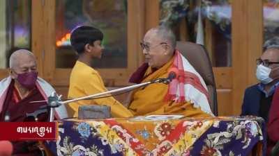 A weird video of the Dalai Lama asking an Indian boy to ‘suck his tongue’