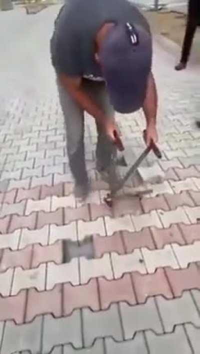 Re-laying pavers in their correct positions