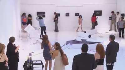 Eric Andre causes mass confusion in a art gallery.