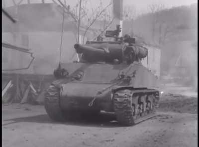 An M36B1 Sherman of the 7th Armored Division in Odingen, Germany on April 10, 1945.