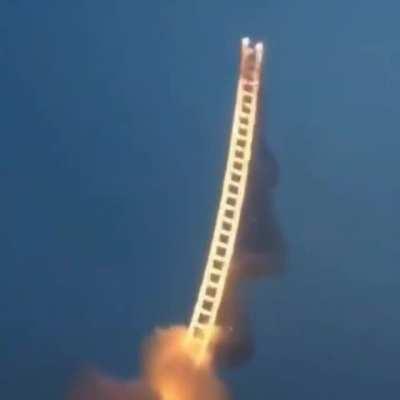 A Chinese artist creates stunning 500m ladder in the sky with fireworks in tribute to his grandmother