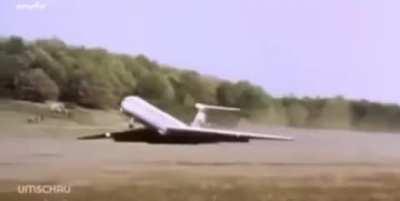 Pilot lands a plane in a field so it can be placed in a nearby museum in Germany, 1989