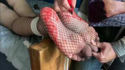 Tickling my partner's feet in fishnets 