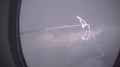 Lighting Striking A Plane