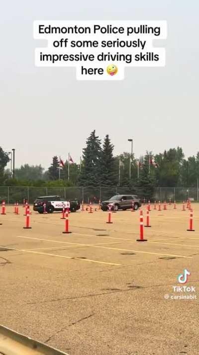 This police officer's ability to drive in reverse is impressive! 