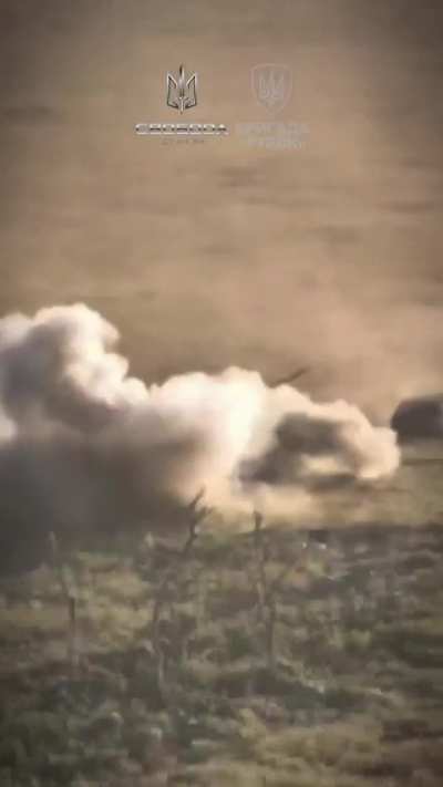 UA ground drone attacks a russian tank. The tank destroys the drone. With its face. Bad quality, let me know if you can find the drone.