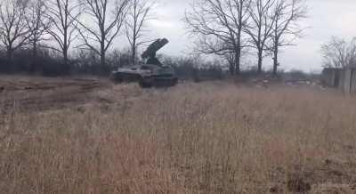 Ukrainian 9K35 Strela-10 engages a Russian drone in the Donetsk Oblast.