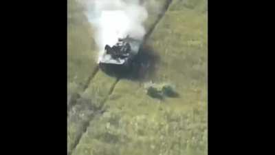 BMP carrying Russian soldiers on top gets hit