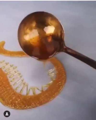 Dragon drawn from caramelized sugar