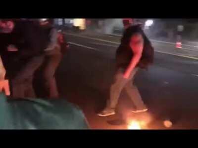 Portlands resident Antifa Clown 'Fire Shoes' does a dance for the crowd