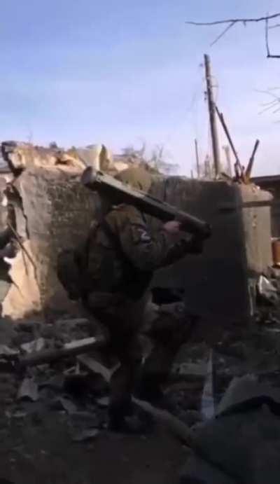 A soldier from Tuva Republic firing on a Ukrainian position, Donbas region, May 2022