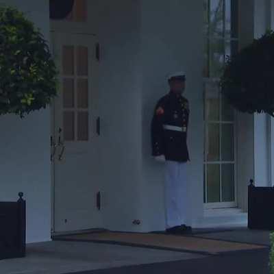 The US Military has rules about weather and lightning. This Sentry is following protocol after a lightning strike rather than abandoning his post out of fear