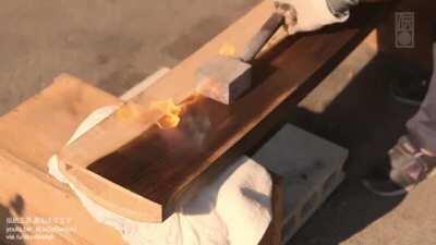 Burning wood for a smooth finish