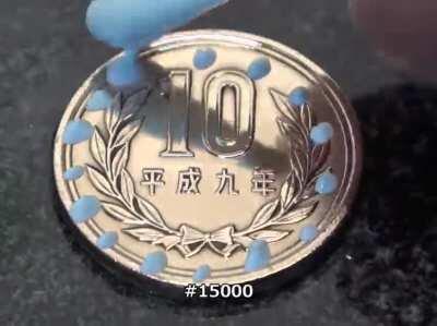 Polishing a 10 yen coin