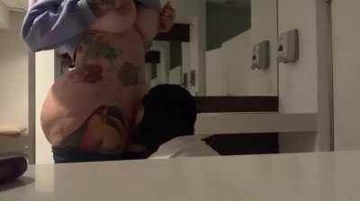 Sucking thick tranny in public restroom